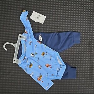 Nike , 2 piece set, sports, blue, onsie  and pants, size 12 months.